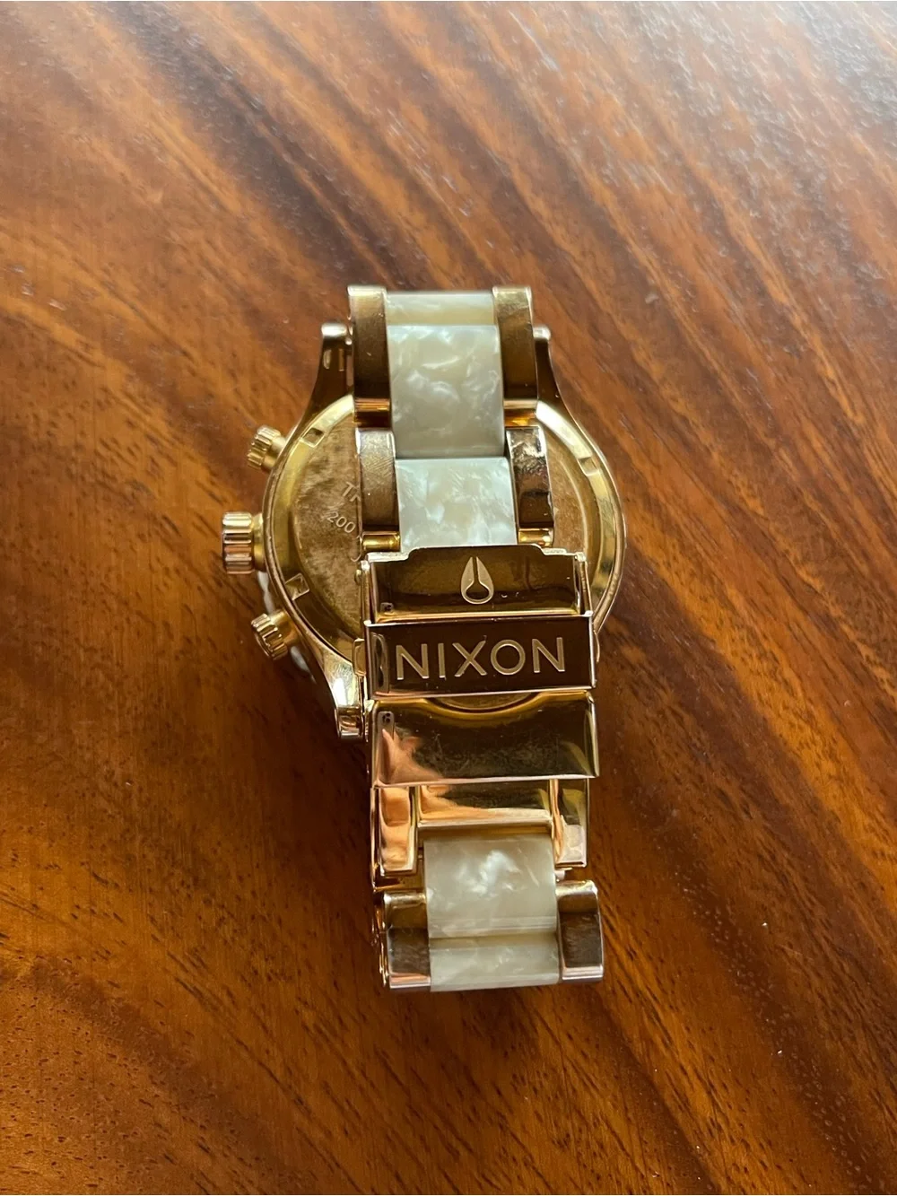 Nixon Rose Gold Chronograph Watch with Pearl White Granite Bezel